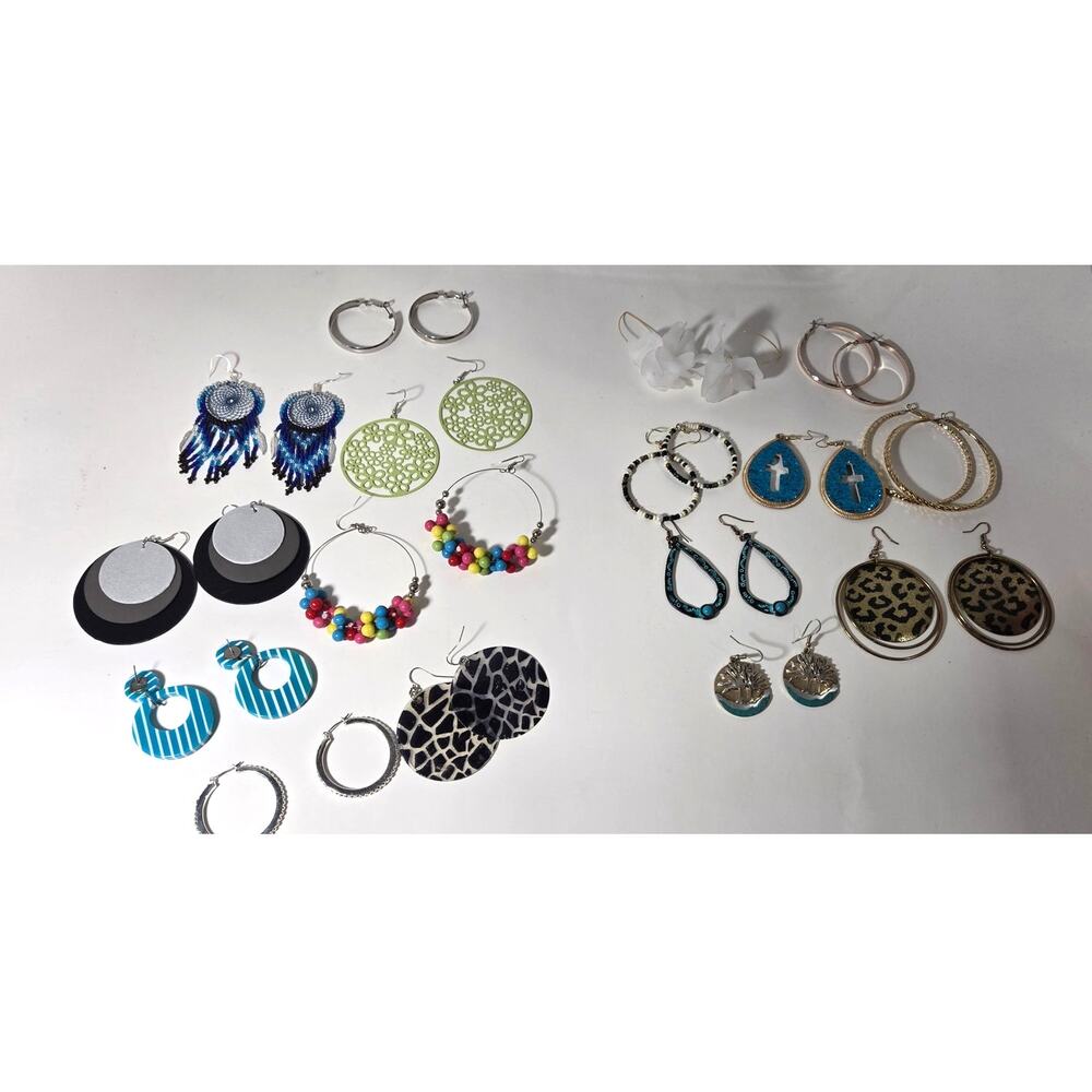 Eight pair dangle/hoop  earrings peirced   2.2113